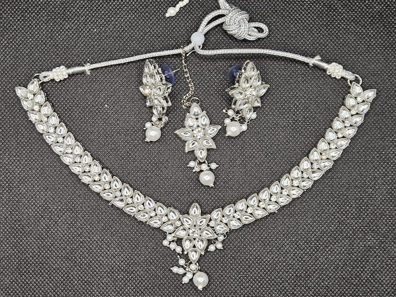 Silver Plated Kundan Stones Jewellery Set With Earrings & Tikka